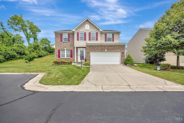 8020 Stoney Ridge Dr, Colerain Twp, OH 45247 - view of front of property with concrete driveway, brick siding, a garage, and a front lawn