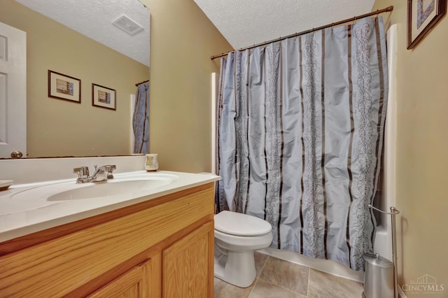 8020 Stoney Ridge Dr, Colerain Twp, OH 45247 - bathroom with a textured ceiling, vanity, curtained shower, and tile patterned flooring