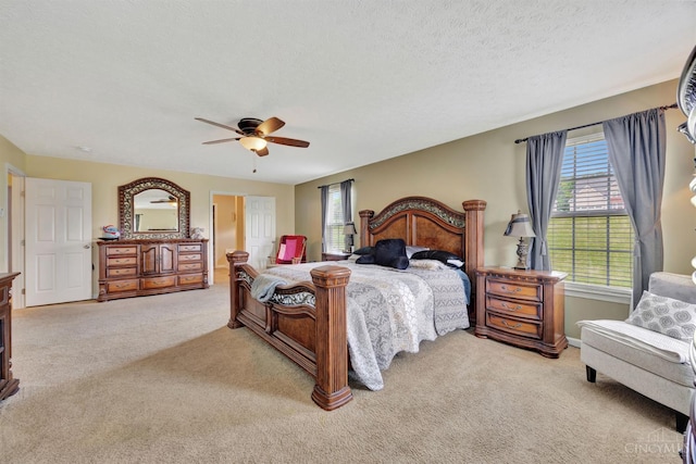 8020 Stoney Ridge Dr, Colerain Twp, OH 45247 - bedroom with light colored carpet, a ceiling fan, and a textured ceiling