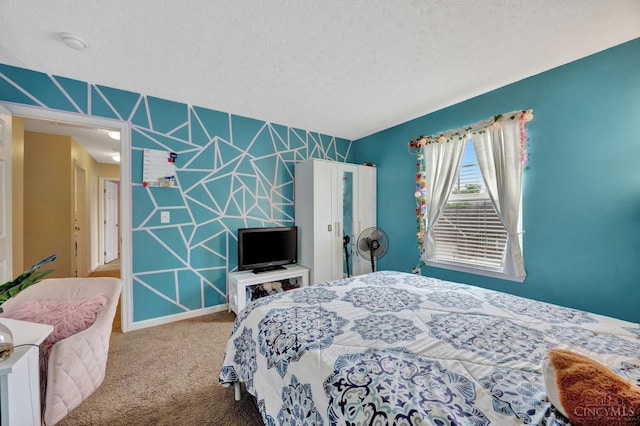 8020 Stoney Ridge Dr, Colerain Twp, OH 45247 - carpeted bedroom featuring a textured ceiling and baseboards