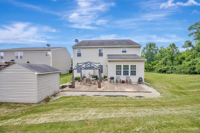 8020 Stoney Ridge Dr, Colerain Twp, OH 45247 - back of house featuring a patio, a yard, and a storage shed