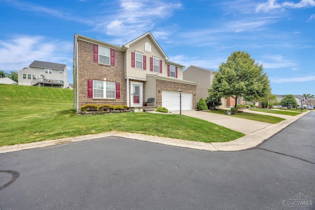 8020 Stoney Ridge Dr, Colerain Twp, OH 45247 - view of front of house with driveway, brick siding, a garage, and a front lawn