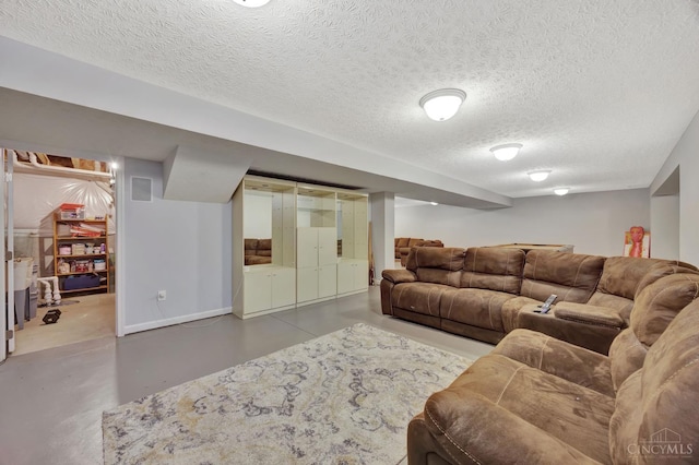 8020 Stoney Ridge Dr, Colerain Twp, OH 45247 - living room with concrete flooring and a textured ceiling