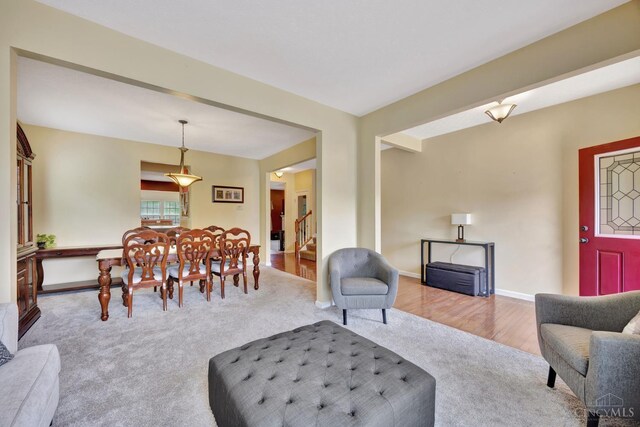 8020 Stoney Ridge Dr, Colerain Twp, OH 45247 - carpeted living area with stairs and baseboards