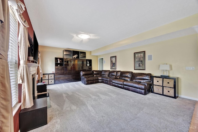 8020 Stoney Ridge Dr, Colerain Twp, OH 45247 - carpeted living area featuring a fireplace and baseboards