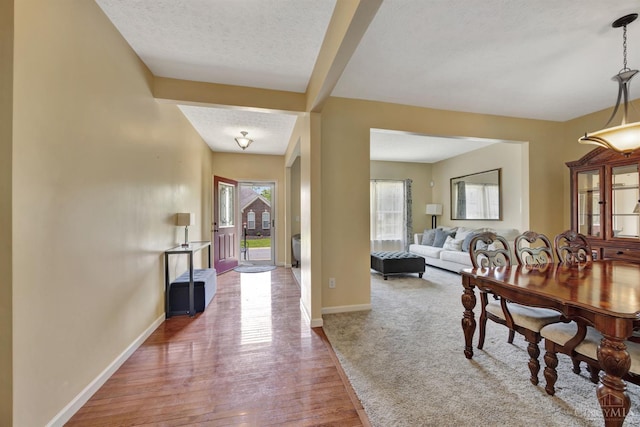 8020 Stoney Ridge Dr, Colerain Twp, OH 45247 - dining space featuring a textured ceiling and wood finished floors