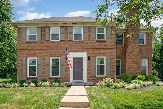 2201 Candlemaker Dr, Anderson Twp, OH 45244 - view of front of house with a front yard and brick siding