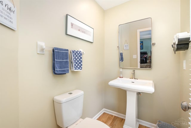 2201 Candlemaker Dr, Anderson Twp, OH 45244 - bathroom with baseboards and wood finished floors