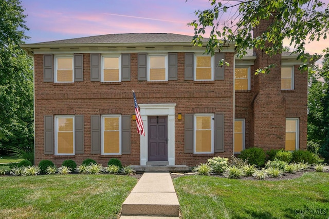 2201 Candlemaker Dr, Anderson Twp, OH 45244 - view of front facade with brick siding and a front lawn