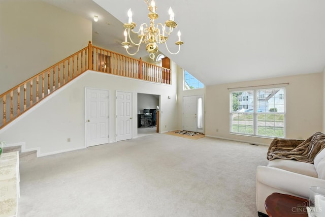 1287 Mcguffey Ln, Union Twp, OH 45103 - living room with high vaulted ceiling, a chandelier, carpet, and stairway