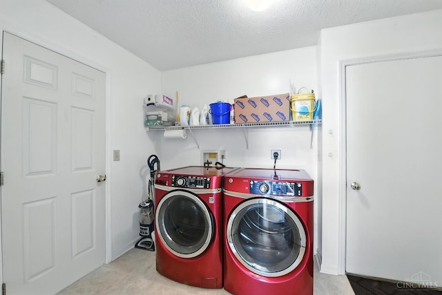 1287 Mcguffey Ln, Union Twp, OH 45103 - laundry room featuring separate washer and dryer and a textured ceiling