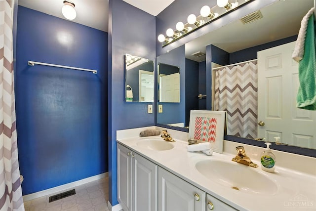 1287 Mcguffey Ln, Union Twp, OH 45103 - full bathroom featuring double vanity and a shower with shower curtain