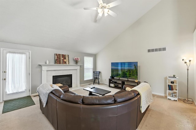 1287 Mcguffey Ln, Union Twp, OH 45103 - living room with light carpet, a tile fireplace, high vaulted ceiling, and ceiling fan