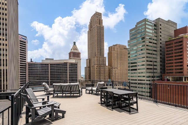 26 E Sixth St Unit 403, Cincinnati, OH 45202 - wooden deck with an outdoor hangout area and a city view