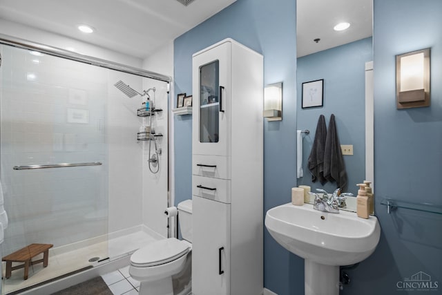 26 E Sixth St Unit 403, Cincinnati, OH 45202 - bathroom featuring a shower stall and tile patterned flooring