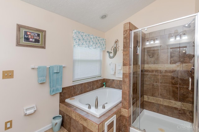 2220 Sulky Ct, Beavercreek Twp, OH 45434 - bathroom with a bath, a stall shower, and a textured ceiling