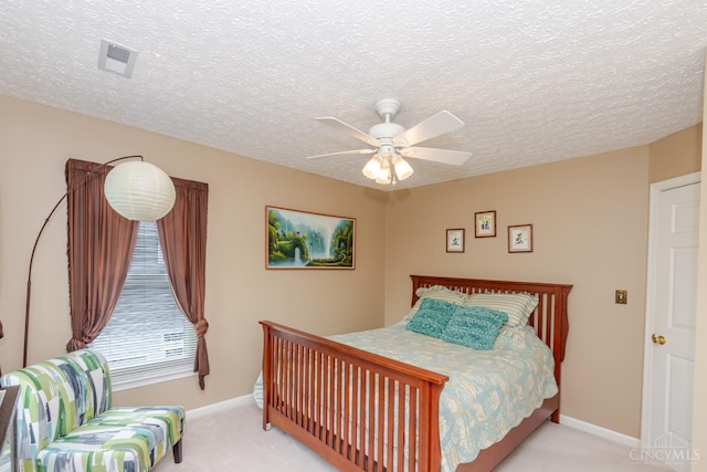 2220 Sulky Ct, Beavercreek Twp, OH 45434 - bedroom with light colored carpet, a textured ceiling, and ceiling fan