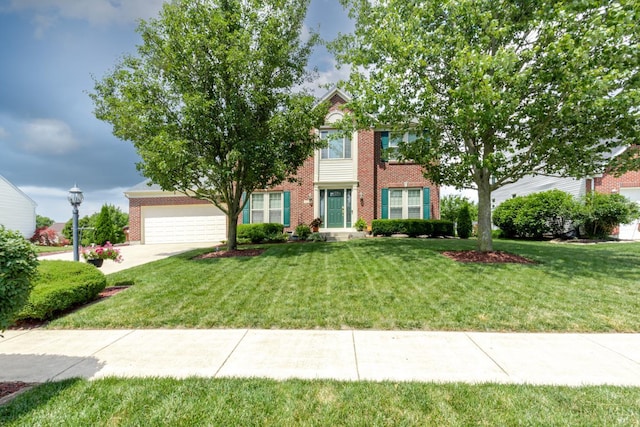 2220 Sulky Ct, Beavercreek Twp, OH 45434 - view of front of house with brick siding, a front lawn, an attached garage, and concrete driveway