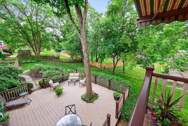 5613 Williamsburg Way, Fairfield, OH 45014 - wooden deck featuring a fenced backyard and an outdoor hangout area
