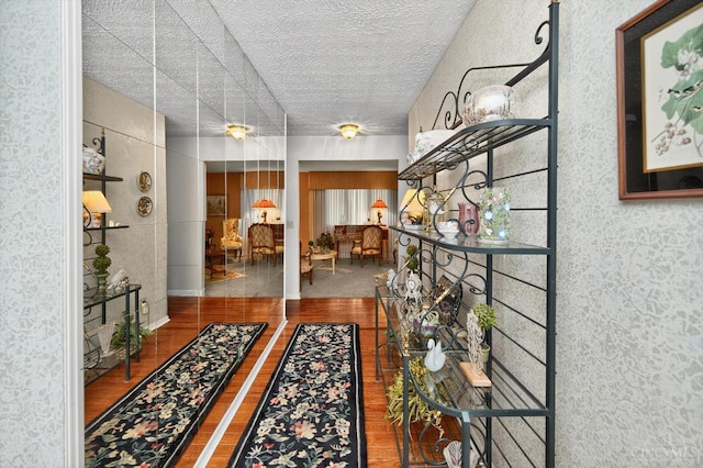 5613 Williamsburg Way, Fairfield, OH 45014 - corridor with a textured ceiling and wood finished floors