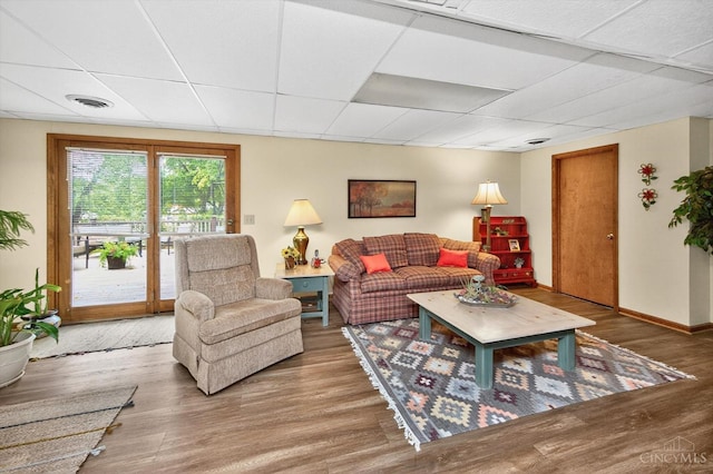 5613 Williamsburg Way, Fairfield, OH 45014 - living area featuring a paneled ceiling and wood finished floors