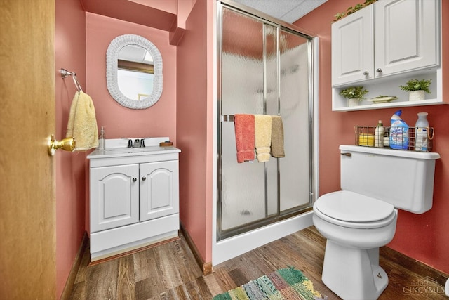 5613 Williamsburg Way, Fairfield, OH 45014 - bathroom with wood finished floors, vanity, and a stall shower