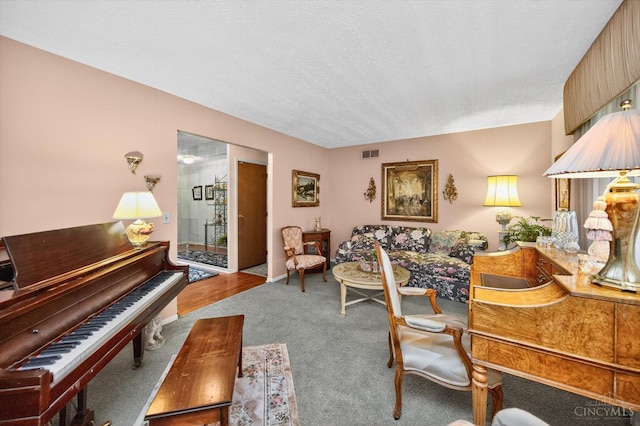 5613 Williamsburg Way, Fairfield, OH 45014 - carpeted living room featuring a textured ceiling