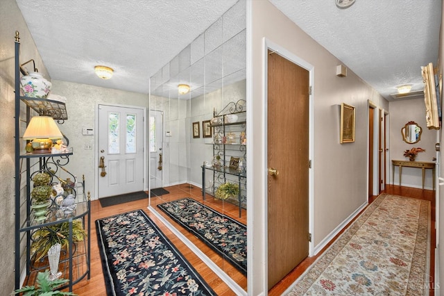5613 Williamsburg Way, Fairfield, OH 45014 - entryway with a textured ceiling and wood finished floors