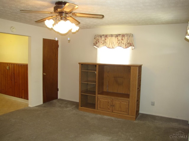 2573 Adams Rd, Colerain Twp, OH 45231 - unfurnished living room featuring ceiling fan, a textured ceiling, and carpet
