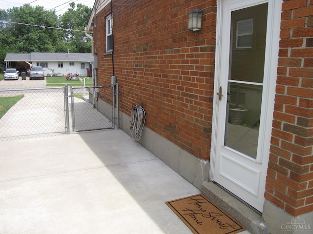 2573 Adams Rd, Colerain Twp, OH 45231 - view of patio / terrace with a gate