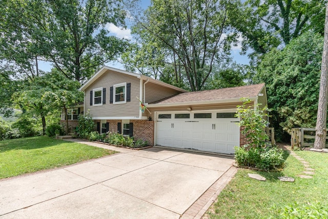 8558 High Trail Ct, Deerfield Twp, OH 45040 - tri-level home with brick siding, a garage, concrete driveway, and a front yard