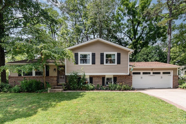 8558 High Trail Ct, Deerfield Twp, OH 45040 - tri-level home featuring brick siding, a garage, concrete driveway, and a front lawn