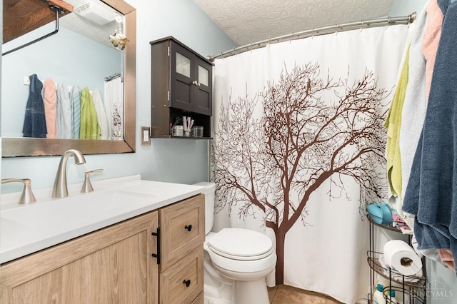 8558 High Trail Ct, Deerfield Twp, OH 45040 - bathroom with vanity, a textured ceiling, tile patterned flooring, and a shower with shower curtain