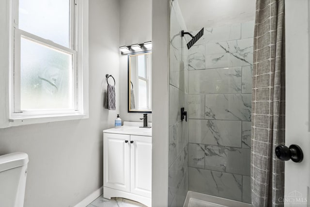 3997 Washington Ave, Cheviot, OH 45211 - bathroom with marble finish floors, a stall shower, and vanity