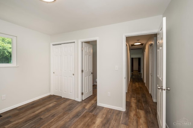 3918 Michael Dr, Union Twp, OH 45255 - unfurnished bedroom with dark wood-style floors and a closet