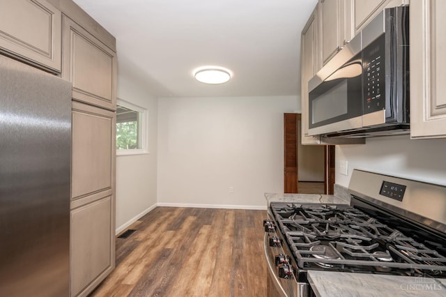 3918 Michael Dr, Union Twp, OH 45255 - kitchen with stainless steel appliances and wood finished floors
