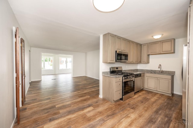 3918 Michael Dr, Union Twp, OH 45255 - kitchen featuring stainless steel appliances, dark wood-style floors, and open floor plan