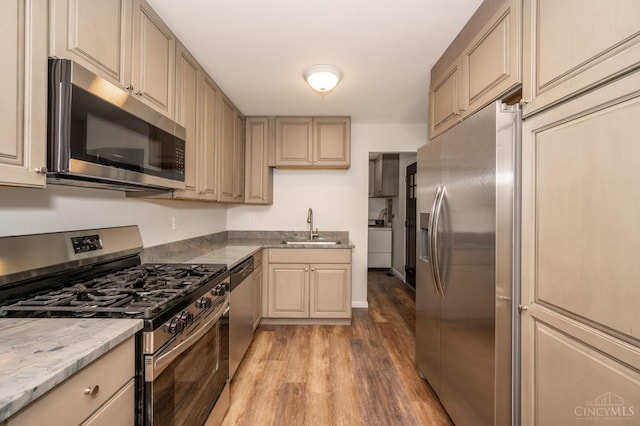 3918 Michael Dr, Union Twp, OH 45255 - kitchen with appliances with stainless steel finishes and light wood-style flooring