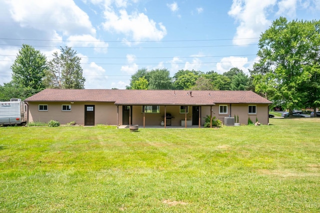 3918 Michael Dr, Union Twp, OH 45255 - back of property featuring a patio area and a lawn