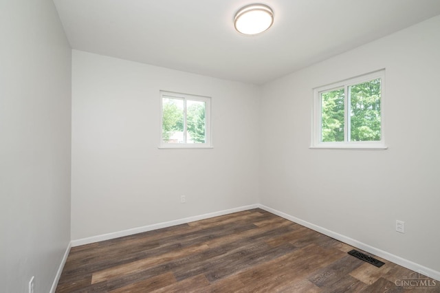 3918 Michael Dr, Union Twp, OH 45255 - unfurnished room with baseboards and dark wood-style flooring