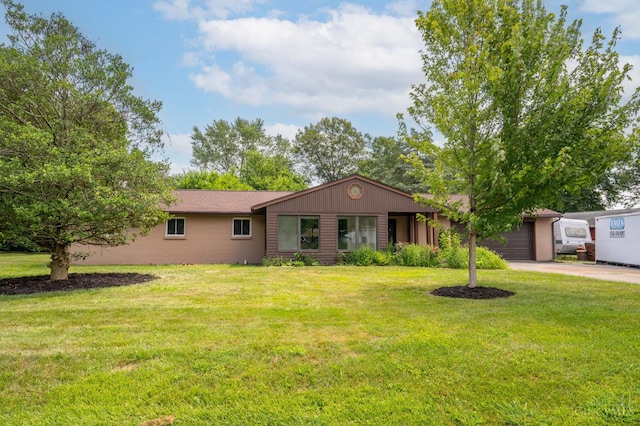 3918 Michael Dr, Union Twp, OH 45255 - ranch-style house with an attached garage, driveway, and a front lawn