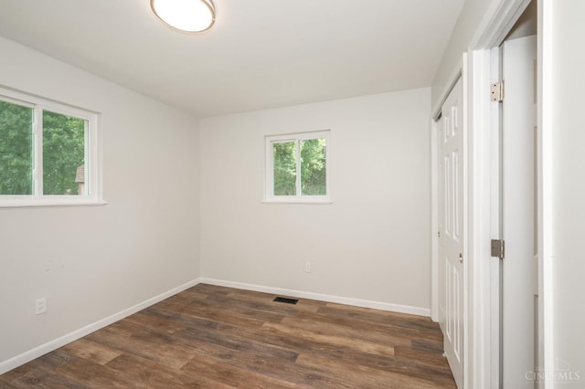 3918 Michael Dr, Union Twp, OH 45255 - spare room with dark wood-style flooring and baseboards
