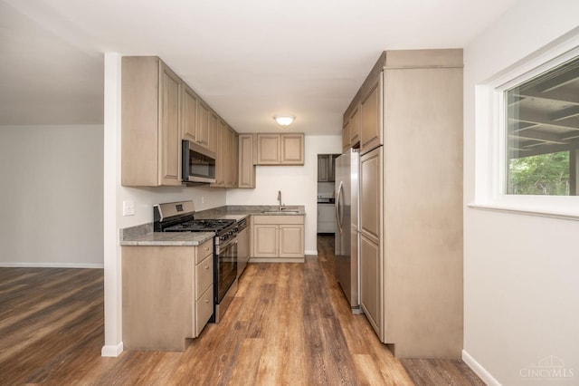 3918 Michael Dr, Union Twp, OH 45255 - kitchen with appliances with stainless steel finishes and wood finished floors