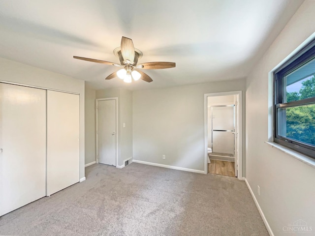 3198 Sunnyhollow Ln, Green Twp, OH 45239 - unfurnished bedroom featuring carpet, a closet, ensuite bath, and ceiling fan