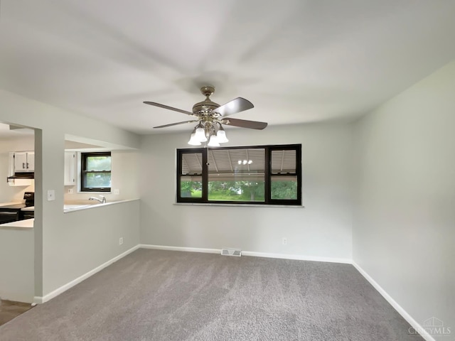 3198 Sunnyhollow Ln, Green Twp, OH 45239 - spare room featuring ceiling fan and carpet