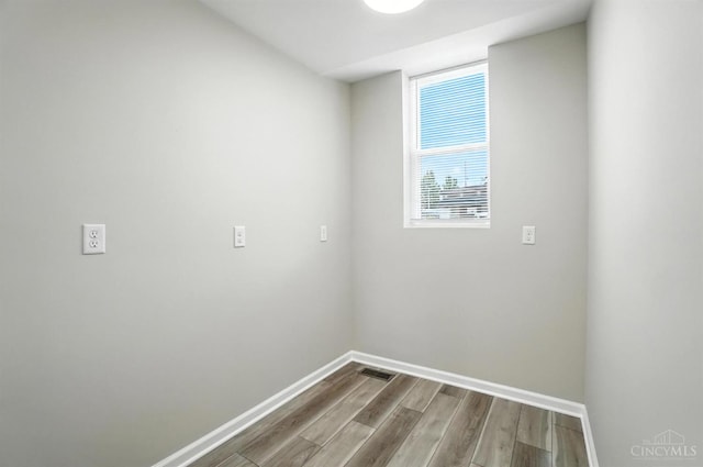 1582 Dixmont Ave, Cincinnati, OH 45207 - empty room with baseboards and wood finished floors