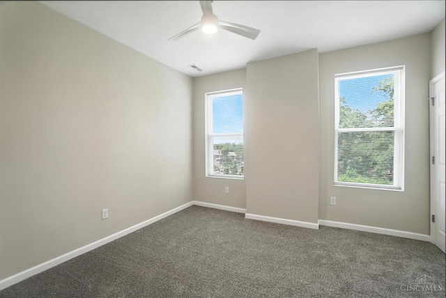 1582 Dixmont Ave, Cincinnati, OH 45207 - spare room with a ceiling fan and dark carpet