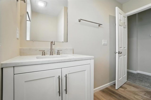 1582 Dixmont Ave, Cincinnati, OH 45207 - bathroom with wood finished floors and vanity