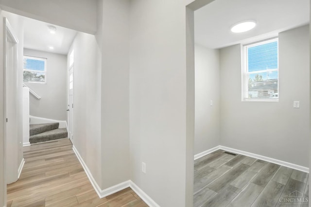 1582 Dixmont Ave, Cincinnati, OH 45207 - hall featuring light wood-style floors and stairway