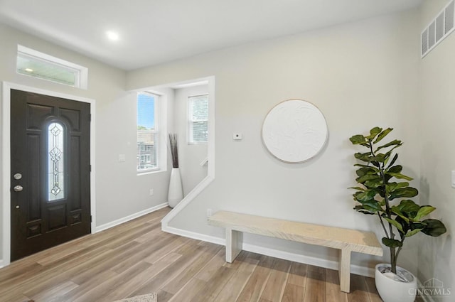 1582 Dixmont Ave, Cincinnati, OH 45207 - entrance foyer with light wood finished floors and baseboards